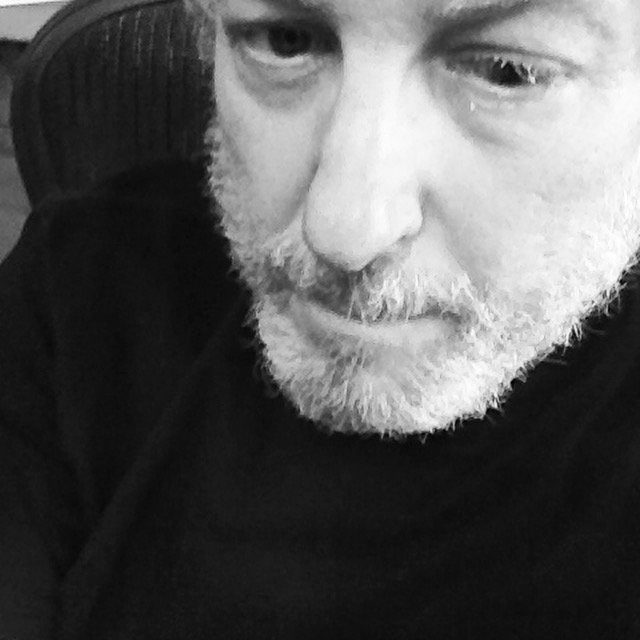 black and white headshot of Robert Dannin